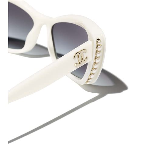 how much are chanel eyeglasses|Chanel sunglasses with white trim.